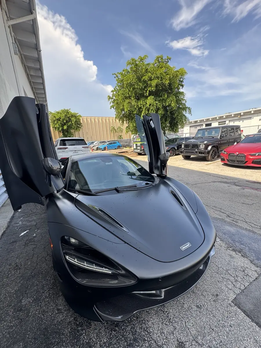 Matte black McLaren after professional detailing