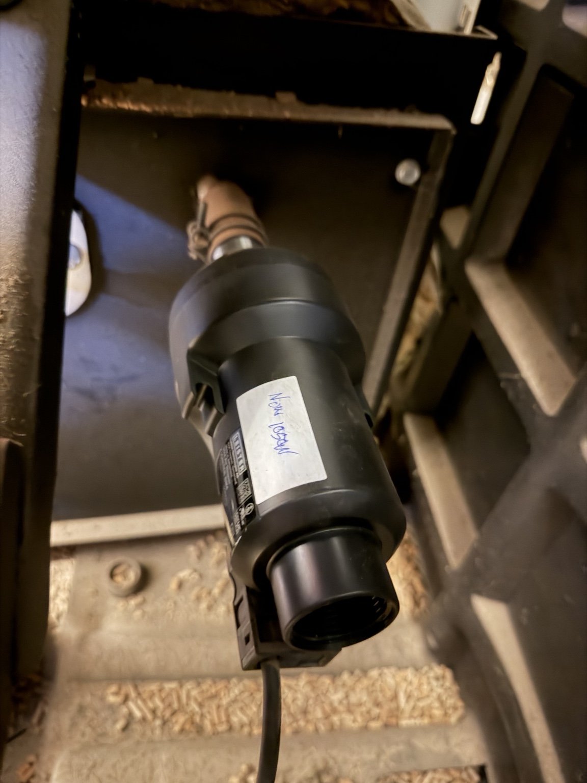 Close-up of an accessible drive motor inside the Fröling P4 400 biomass heating system